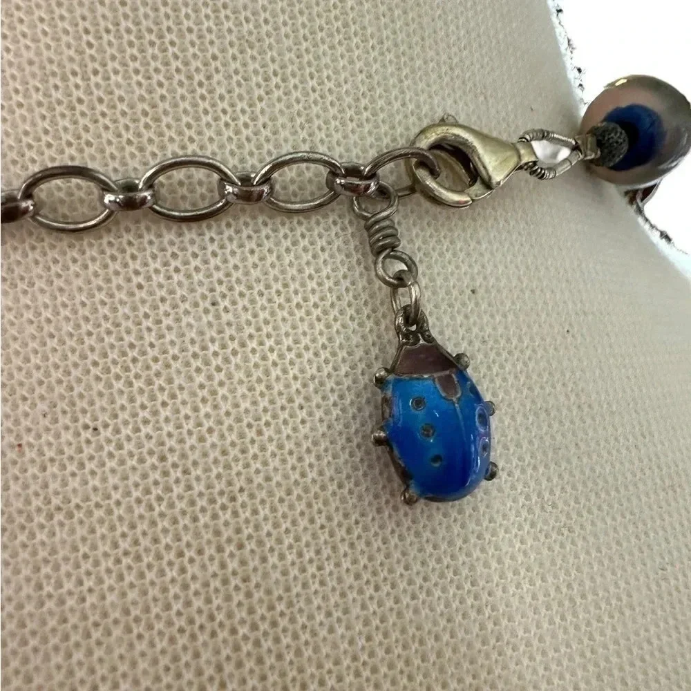 Beautiful colorful beaded necklace with ladybug charm